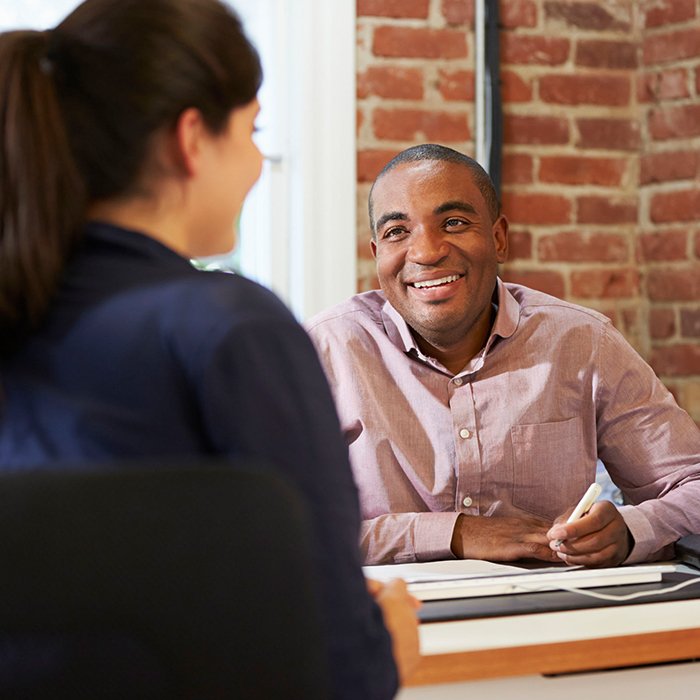 Inhouse professional discussing options with patient
